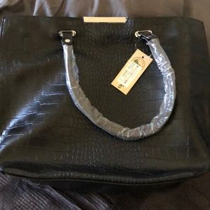 Uhura Liabeth Black purse. Clark’s original.